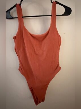 Vitamin A one piece burnt orange scoop neck ripple texture size M